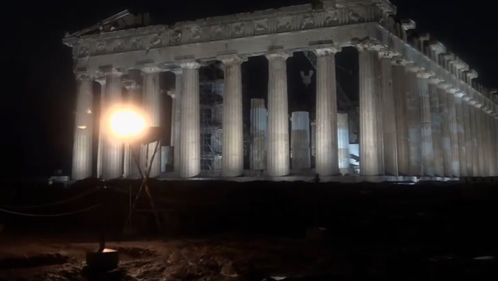 Moment cauldron atop Acropolis lit with Olympic torch as relay arrives in Athens